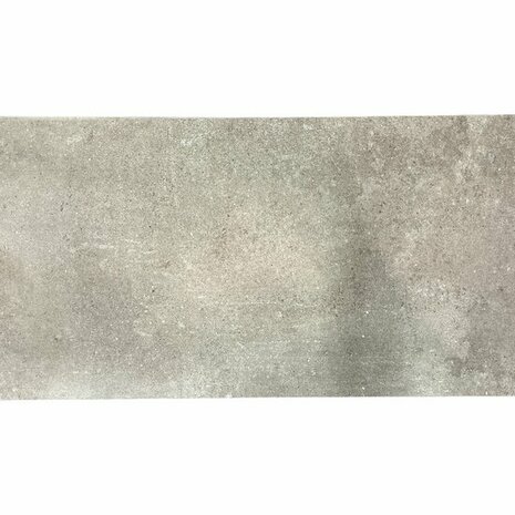 Grote, vlakke betonplaat met een lichte grijstint en een fijne, ruwe textuur.